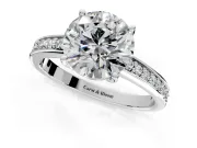 Solitaire Engagement Ring Setting for Round Cut Center with Channel-Set Accent Band and Prong Head in White Gold