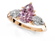 3 Stone Engagement Ring Setting for Fancy Pink Pear-Shaped Center with Large Pear-Shaped Accents and Prong Head in Rose Gold