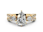 3 Stone Engagement Ring Setting for Pear-Shaped Center with Pave Split Shank and Prong Head in Yellow Gold