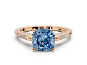 Solitaire Engagement Ring Setting for Fancy Blue Cushion Cut Center with Channel Accents and Prong Head in Rose Gold