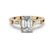3 Stone Engagement Ring Setting for Emerald Cut Center with Channel Baguette Accents and Prong Head in Yellow Gold