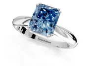 Solitaire Engagement Ring Setting for Fancy Blue Radiant Cut Center with Reverse Tapered Band and Prong Head in Platinum
