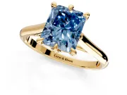Solitaire Engagement Ring Setting for Fancy Blue Radiant Cut Center with Cathedral Band and Prong Head in Yellow Gold