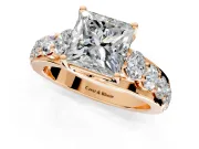 Solitaire Engagement Ring Setting for Princess Cut Center with Graduated Shared Prongs and Prong Head in Rose Gold