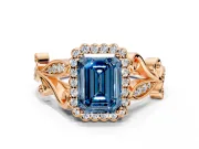 Halo Engagement Ring Setting for Fancy Blue Emerald Cut Center with Leaf Motif Split Shank and Prong Head in Rose Gold
