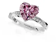 Side Accent Engagement Ring Setting for Fancy Pink Heart-Shaped Center with Accent Shoulders and Prong Head in Platinum