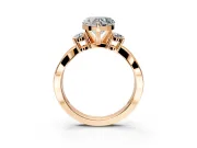 3 Stone Engagement Ring Setting for Heart-Shaped Center with Pave Twist Band and Prong Head in Rose Gold