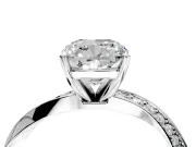 Side Accent Engagement Ring Setting for Cushion Cut Center with Accent Shoulders and Prong Head in Platinum