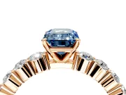 Shared-Prong Engagement Ring Setting for Fancy Blue Emerald Cut Center with Graduated Accents and Prong Head in Rose Gold