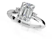 3 Stone Engagement Ring Setting for Emerald Cut Center with Low-Set Round Cut Accents and Prong Head in Sterling Silver