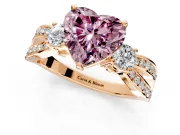 3 Stone Engagement Ring Setting for Fancy Pink Heart-Shaped Center with Pave Twist Band and Prong Head in Rose Gold
