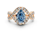 Halo Engagement Ring Setting for Fancy Blue Pear-Shaped Center with Pave Infinity Twist Band and Prong Head in Rose Gold