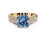Solitaire Engagement Ring Setting for Fancy Blue Cushion Cut Center with Round Cut Channel Band and Prong Head in Yellow Gold