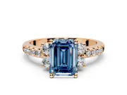 Paired Accent Engagement Ring Setting for Fancy Blue Emerald Cut Center with Pave Band and Prong Head in Rose Gold