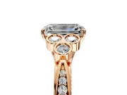 Cluster Engagement Ring Setting for Emerald Cut Center with Bezel Accent Clusters and Prong Head in Rose Gold