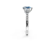 Paired Accent Engagement Ring Setting for Fancy Blue Pear-Shaped Center with Pave Band and Prong Head in White Gold