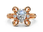 Solitaire Engagement Ring Setting for Pear-Shaped Center with Twisted Band and Scroll Prong Head in Rose Gold