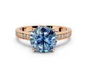 Solitaire Engagement Ring Setting for Fancy Blue Round Cut Center with Channel-Set Accent Band and Prong Head in Rose Gold