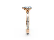 Solitaire Engagement Ring Setting for Fancy Blue Pear-Shaped Center with Channel Baguette Band and Prong Head in Rose Gold