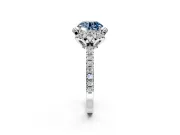 Halo Engagement Ring Setting for Fancy Blue Round Cut Center with Openwork Halo, Pave Band and Prong Head in White Gold