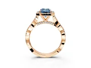 Halo Engagement Ring Setting for Fancy Blue Emerald Cut Center with Twist Band and Prong Head in Rose Gold