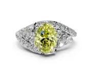 Halo Engagement Ring Setting for Fancy Yellow Oval Center with Marquise and Pave Bypass Band and Prong Head in Platinum