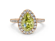 Halo Engagement Ring Setting for Fancy Yellow Pear-Shaped Center with Narrowing Pave Band and Prong Head in Rose Gold