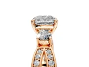 3 Stone Engagement Ring Setting for Cushion Cut Center with Pave Twist Band and Prong Head in Rose Gold