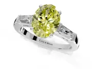 3 Stone Engagement Ring Setting for Fancy Yellow Oval Center with Tapered Baguettes, Plain Band and Prong Head in Platinum