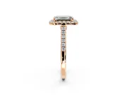 Halo Engagement Ring Setting for Emerald Cut Center with Narrowing Pave Band and Prong Head in Rose Gold