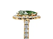 Halo Engagement Ring Setting for Fancy Green Pear-Shaped Center with Narrowing Pave Band and Prong Head in Yellow Gold