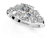 Cluster Engagement Ring Setting for Cushion Cut Center with Round Cut Accent Frame and Prong Head in Platinum