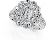 Large Accent Halo Engagement Ring Setting for Emerald Cut Center with Pave Split Shank and Prong Head in Platinum
