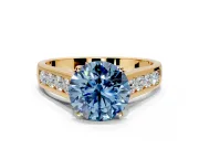 Solitaire Engagement Ring Setting for Fancy Blue Round Cut Center with Cathedral Channel Band and Prong Head in Yellow Gold