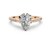 Solitaire Engagement Ring Setting for Pear-Shaped Center with Channel Accents and Prong Head in Rose Gold