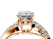 Halo Engagement Ring Setting for Radiant Cut Center with Marquise and Pave Bypass Band and Prong Head in Rose Gold