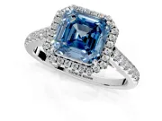 Halo Engagement Ring Setting for Fancy Blue Asscher Cut Center with Narrowing Pave Band and Prong Head in White Gold
