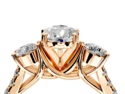 3 Stone Engagement Ring Setting for Pear-Shaped Center with Crossover Basket, Pave Band and Prong Head in Rose Gold