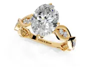 Solitaire Engagement Ring Setting for Oval Center with Accented Twist Band and Leaf Prong Head in Yellow Gold