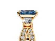 3 Stone Engagement Ring Setting for Fancy Blue Emerald Cut Center with Pave Twist Band and Prong Head in Yellow Gold
