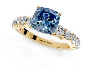 Shared-Prong Engagement Ring Setting for Fancy Blue Cushion Cut Center with Graduated Accents and Prong Head in Yellow Gold