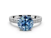 Solitaire Engagement Ring Setting for Fancy Blue Round Cut Center with Channel-Set Accent Band and Prong Head in Platinum