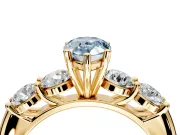 5 Stone Engagement Ring Setting for Fancy Blue Pear-Shaped Center with Graduated Accents and Prong Head in Yellow Gold
