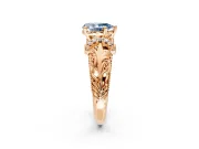 Solitaire Engagement Ring Setting for Fancy Blue Pear-Shaped Center with Filigree Accent Basket and Prong Head in Rose Gold