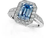 Bezel-Framed Halo Engagement Ring Setting for Fancy Blue Emerald Cut Center with Pave Band and Prong Head in Platinum
