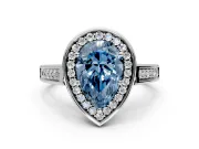 Halo Engagement Ring Setting for Fancy Blue Pear-Shaped Center with Outer Bezel Rim, Pave Band and Prong Head in Platinum