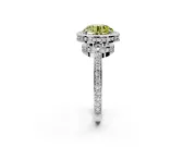 Halo Engagement Ring Setting for Fancy Yellow Round Cut Center with Metal-Rimmed Halo, Pave Band and Prong Head in Platinum