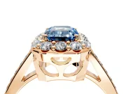 Floral Halo Engagement Ring Setting for Fancy Blue Emerald Cut Center with Large Halo Accents and Prong Head in Rose Gold