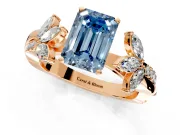 Floral Engagement Ring Setting for Fancy Blue Emerald Cut Center with Trailing Marquise Accents and Prong Head in Rose Gold