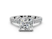 Solitaire Engagement Ring Setting for Princess Cut Center with Crossover Accents and Prong Head in Platinum